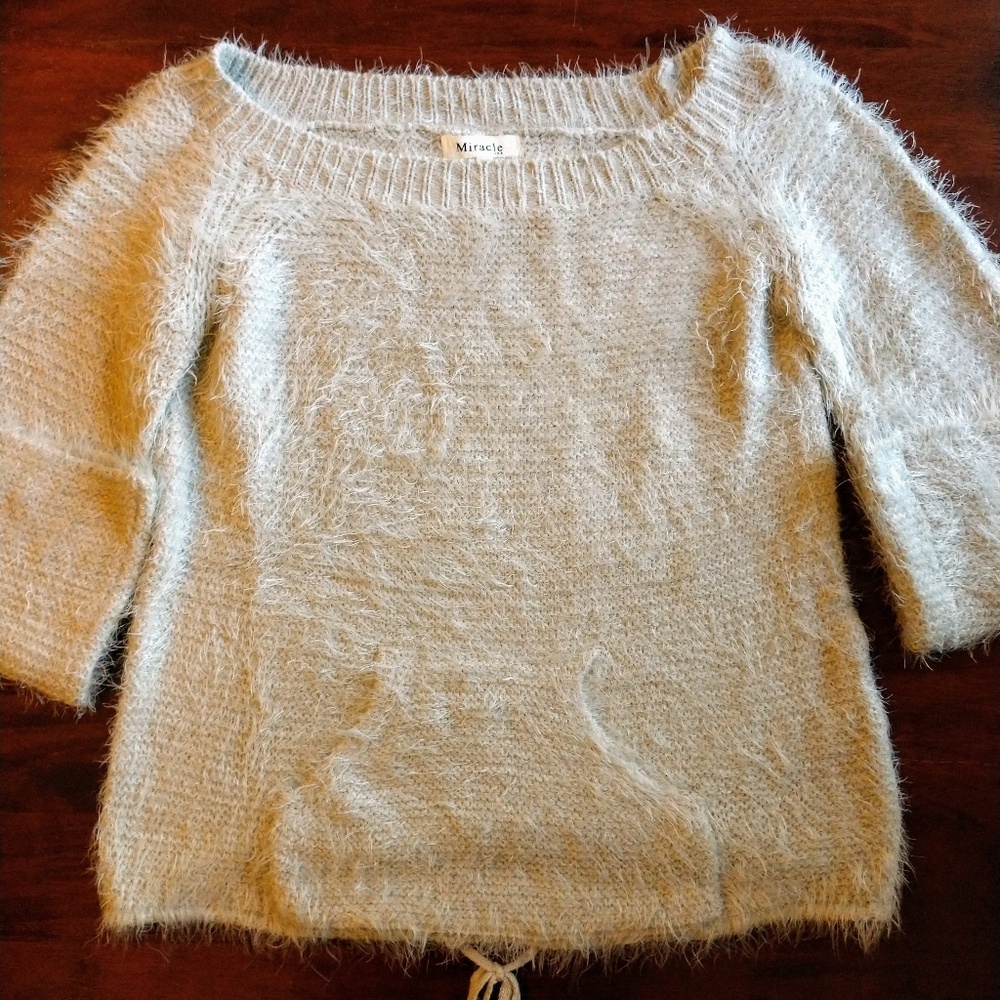 Miracle Sweater, can be worn off the shoulder.
